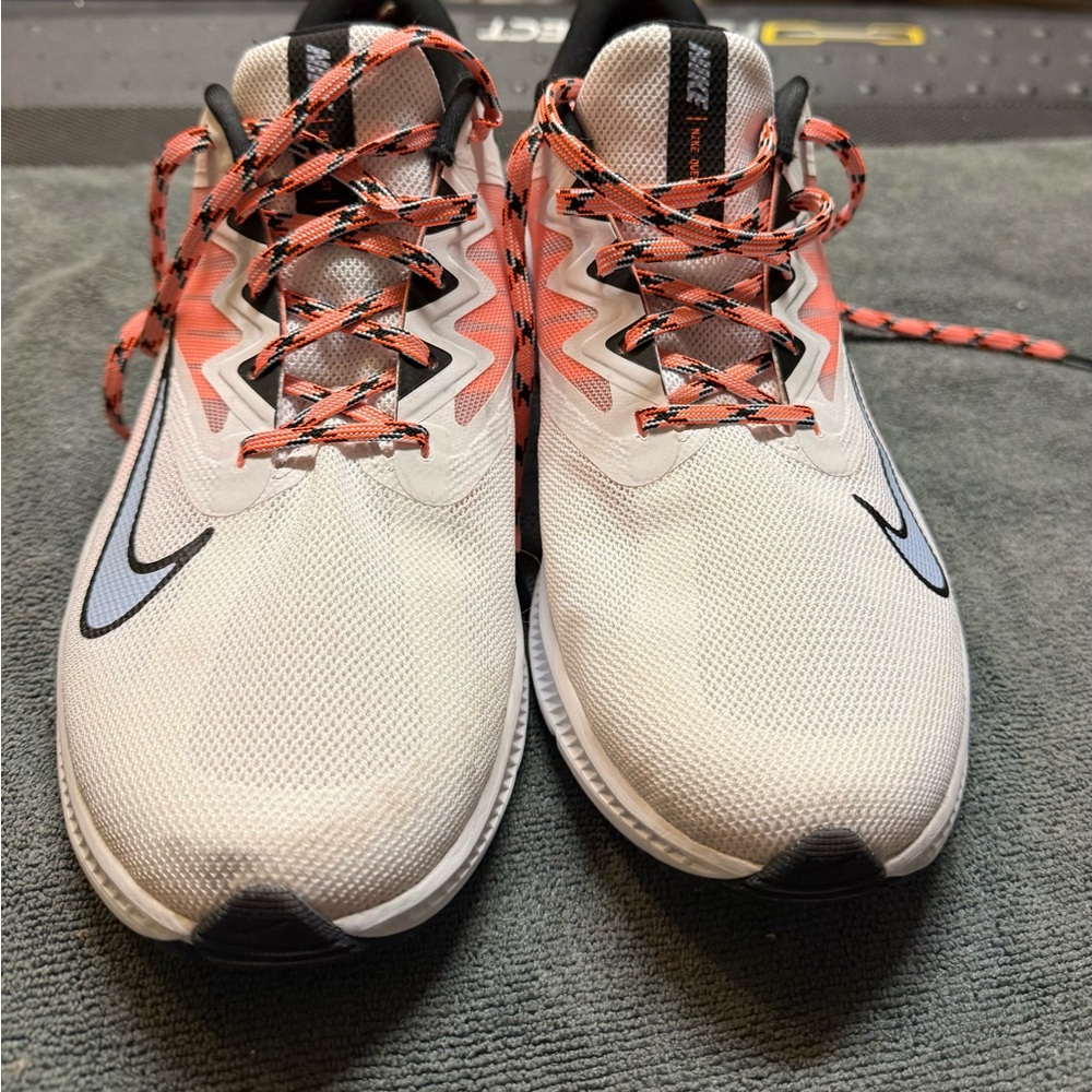 Nike women’s running shoes White and Black with orange Highlights